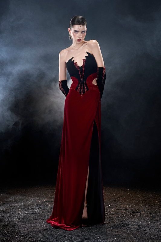 Woman in a red and black evening gown
