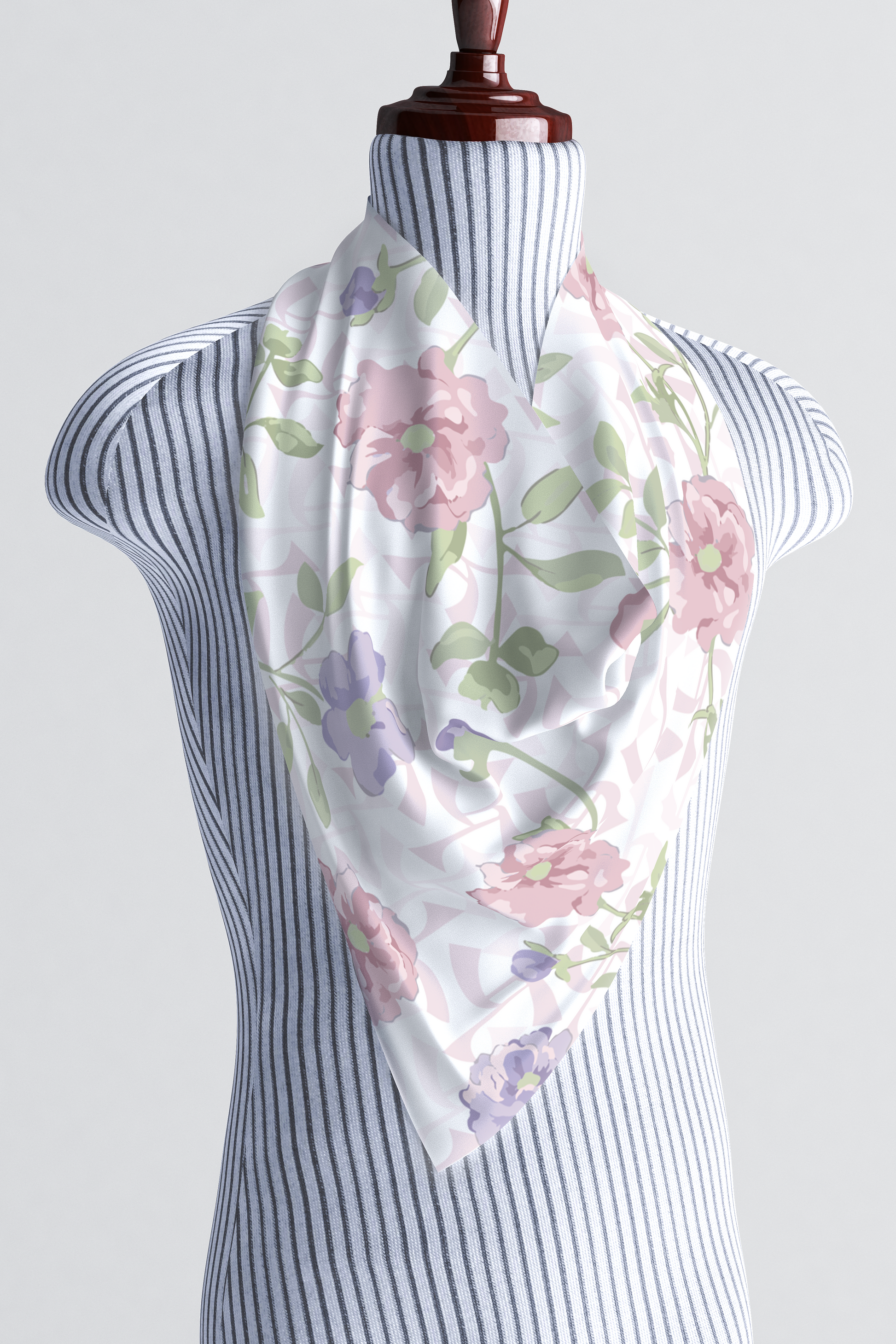Floral silk scarf in pink and lavender worn as a neckerchief.