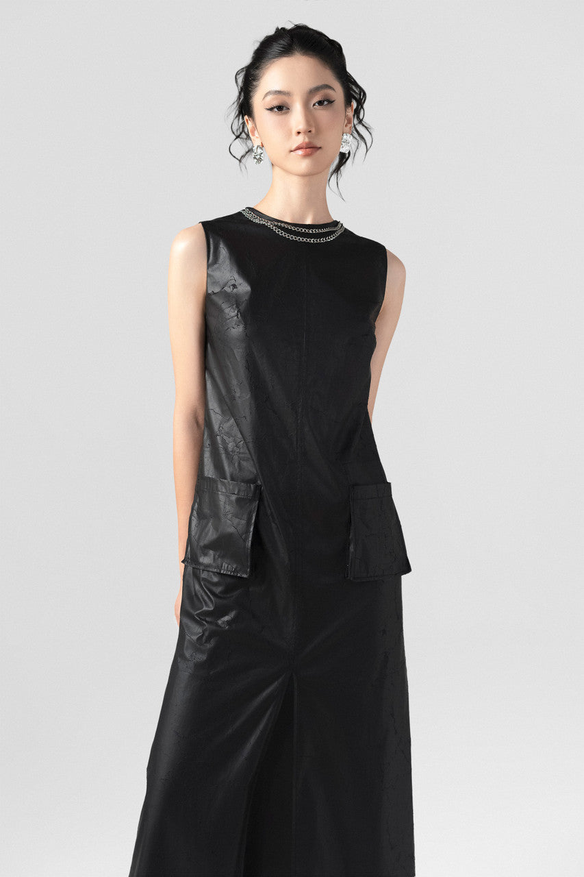 The Black A-Line Maxi Dress features a sleek silhouette with a chic chain-accented neckline.