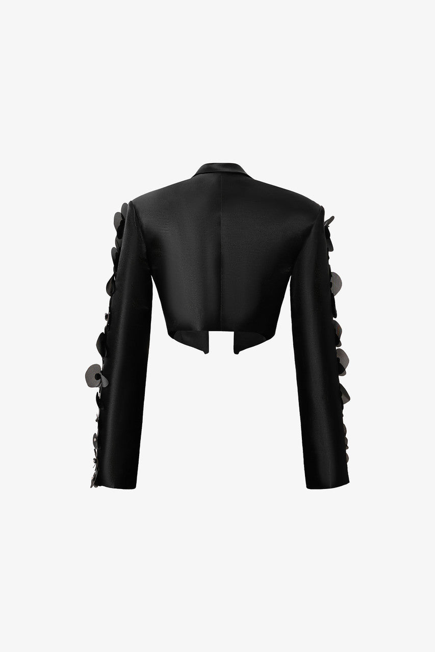 Black structured crop-top blazer in taffeta, embellished orchid.