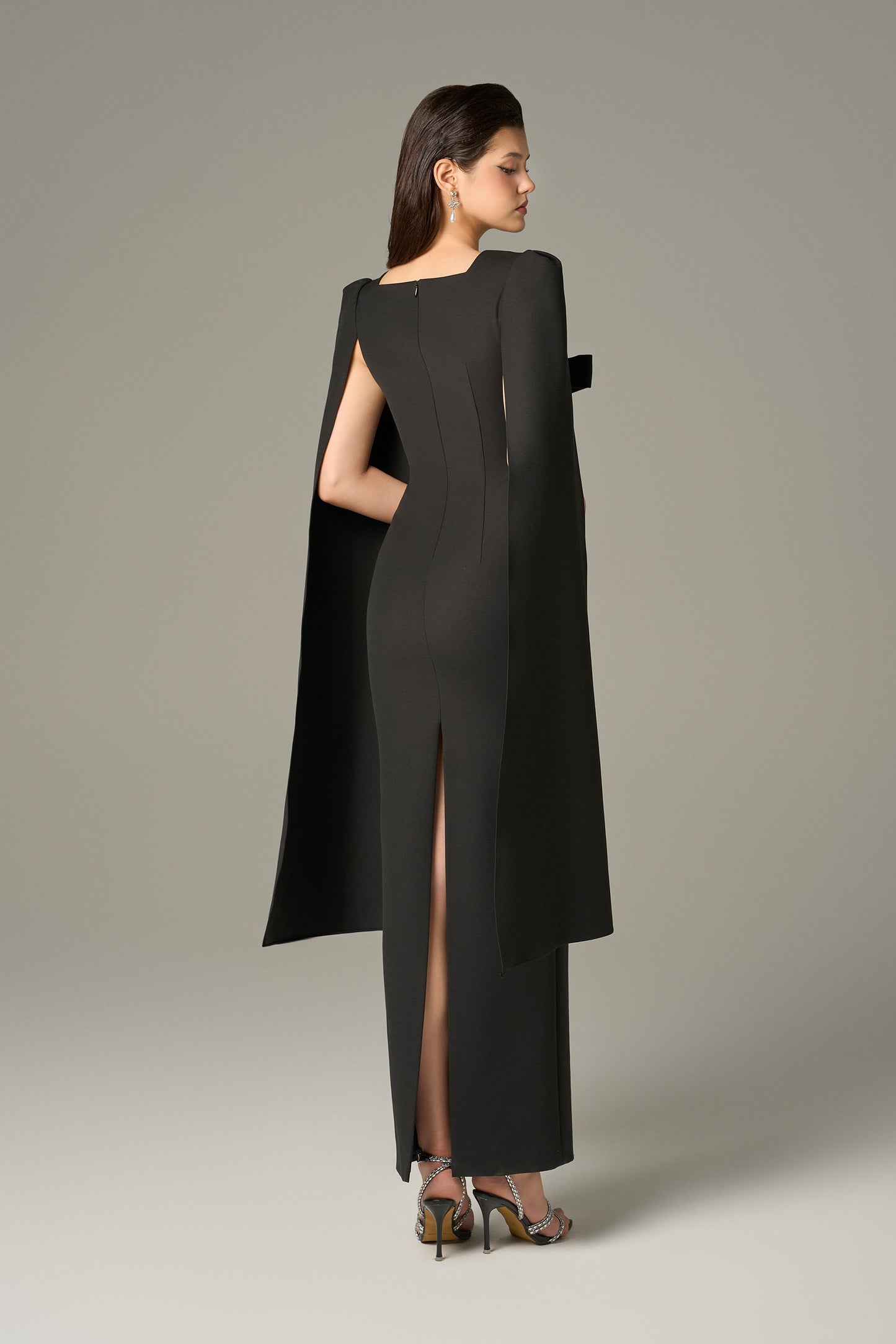 The black Maxi Dress with a delicate back slit.