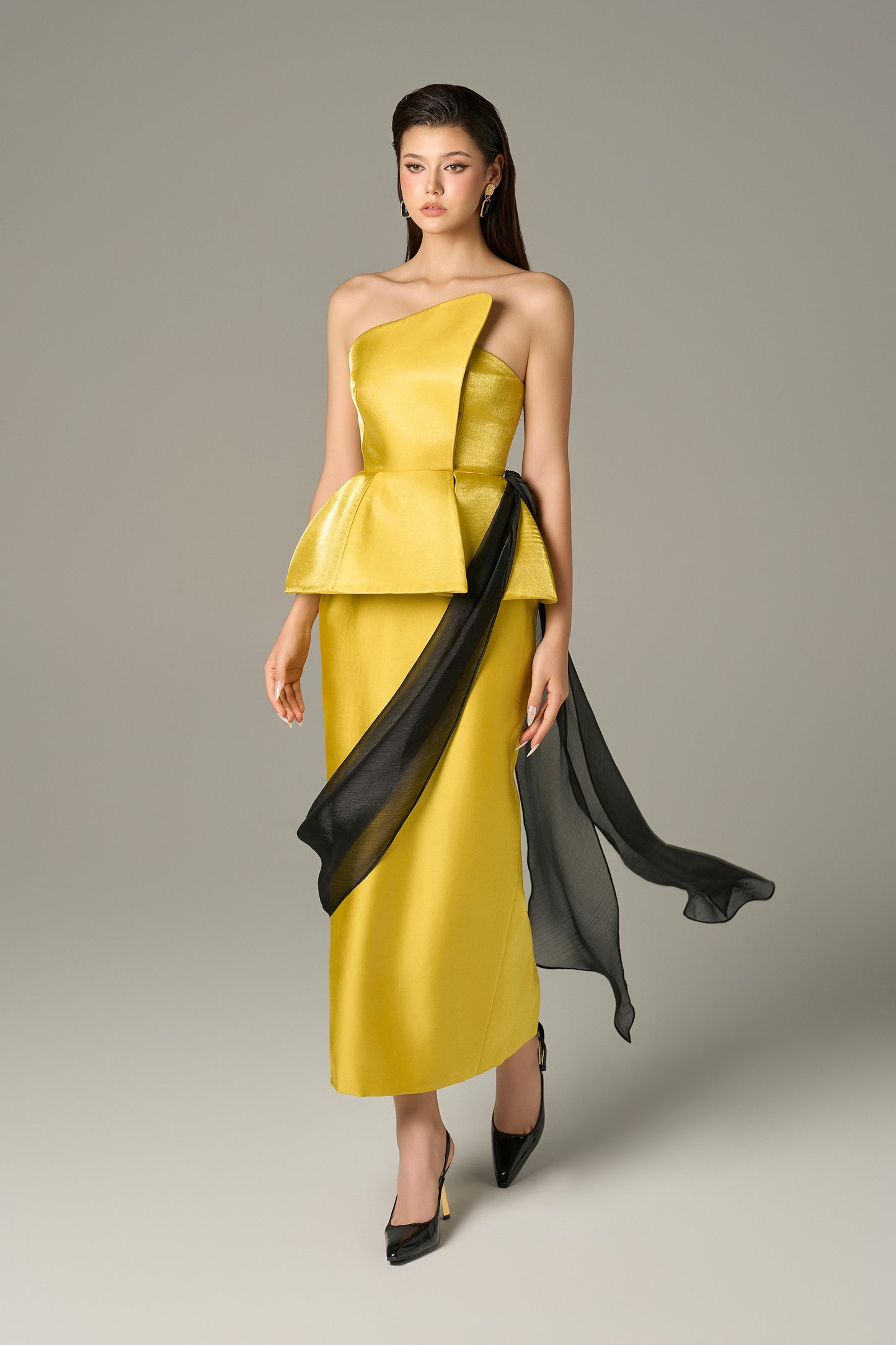 Yellow maxi dress with long black silk flap.