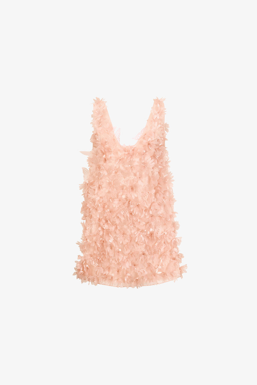 A pink mini dress in organza, with an A-line silhouette and a deep open back with butterfly accent.
