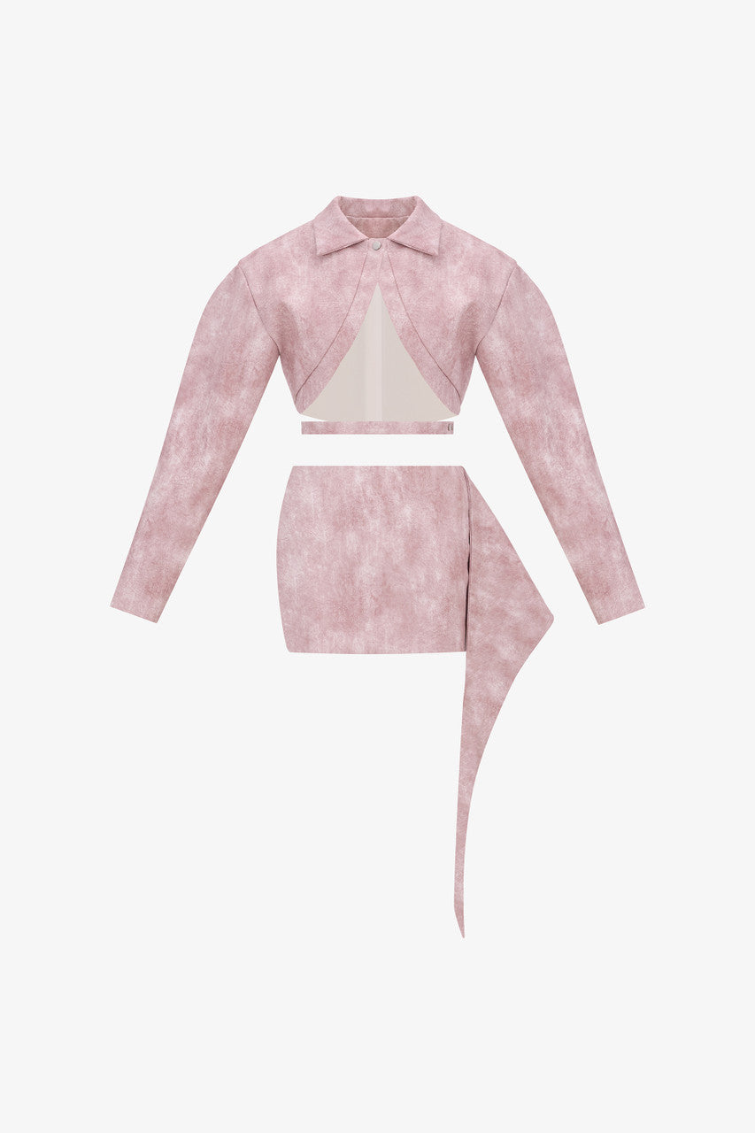 A pink leather set featuring a slim-fit blazer with oversized sleeves, an inverted V-cut neckline, and a matching mini skirt with a side flap.
