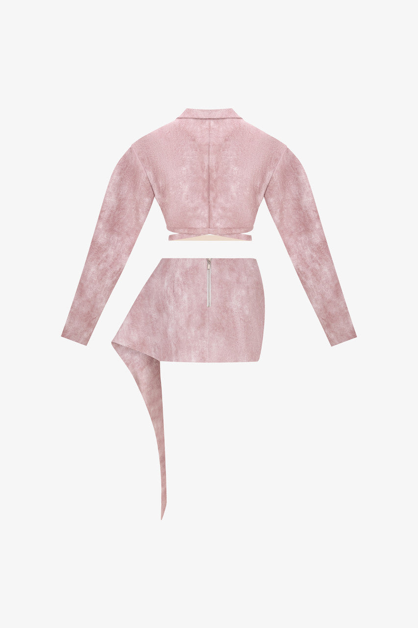 A pink leather set featuring a slim-fit blazer with oversized sleeves, an inverted V-cut neckline, and a matching mini skirt with a side flap.