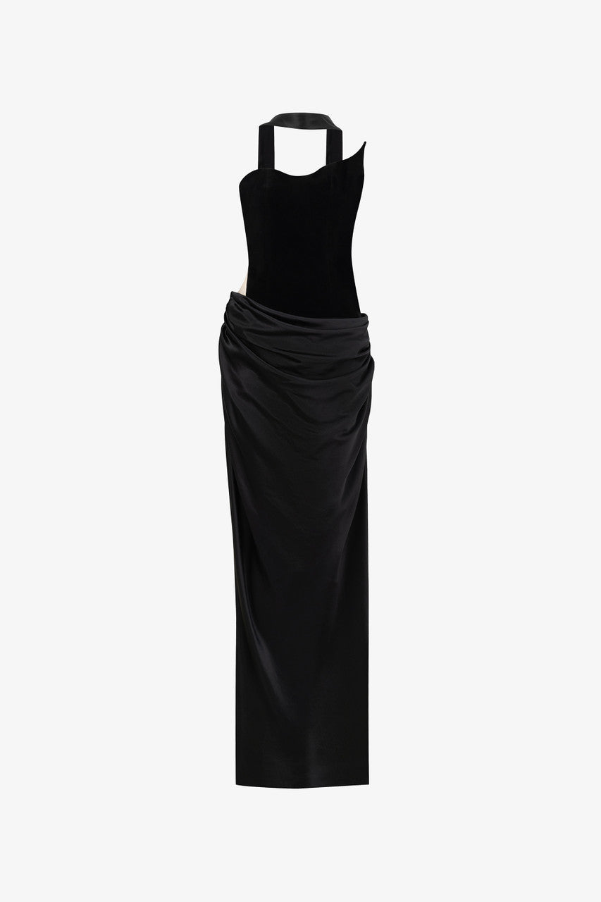 The black maxi dress, combining two premium fabrics: velvet and silk, featuring a matching silk scarf and gloves.