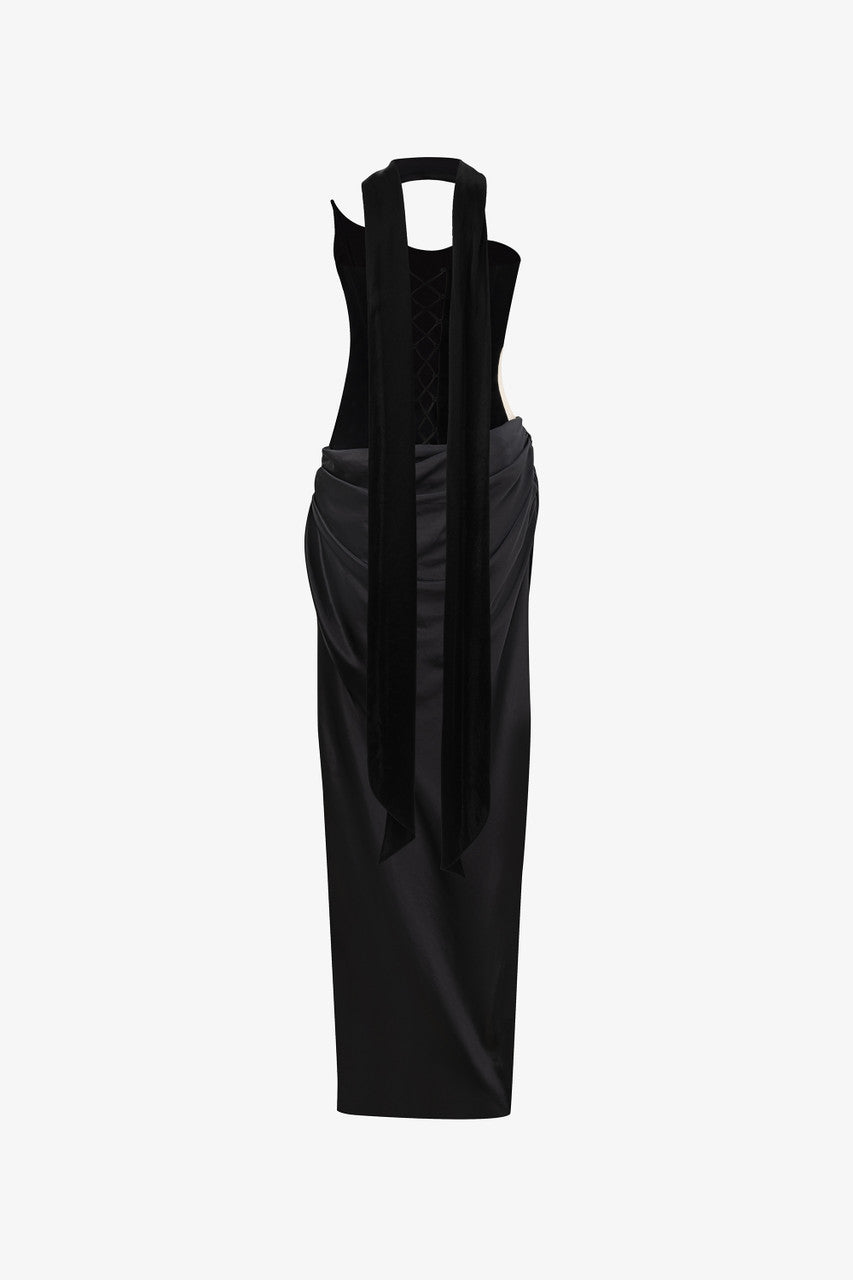 The black maxi dress, combining two premium fabrics: velvet and silk, featuring a matching silk scarf and gloves.