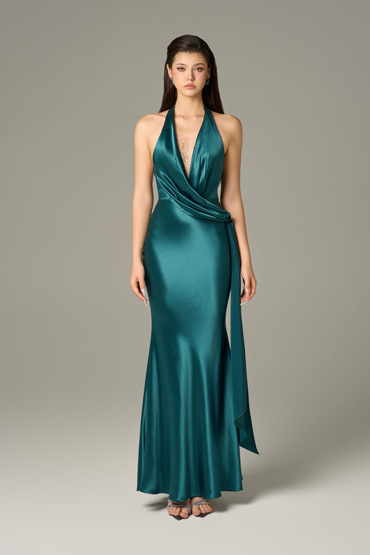 Maxi dress in dark mallard silk, with a halter neckline and a draped detail.