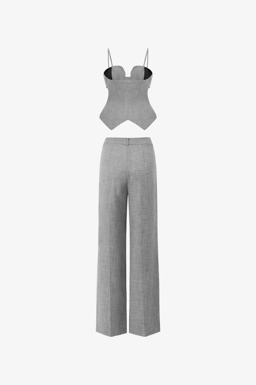 A grey tweed set, featuring a sleeveless waistcoat top with thin spaghetti straps, and long, straight-leg pants.