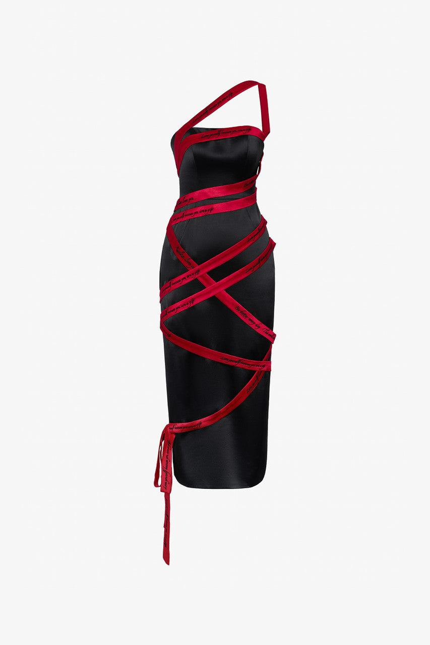 A silk midi dress in black with red embroidered lines.