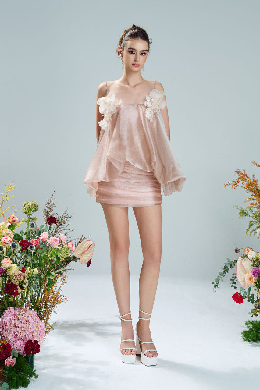 Chiffon top and luxurious taffeta mini skirt. Soft pink hue, cream floral details and ruffled glitter silk.