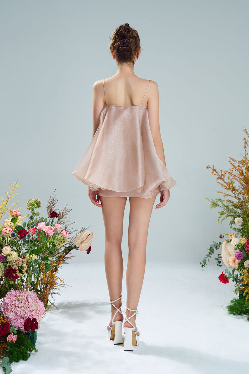 Chiffon top and luxurious taffeta mini skirt. Soft pink hue, cream floral details and ruffled glitter silk.