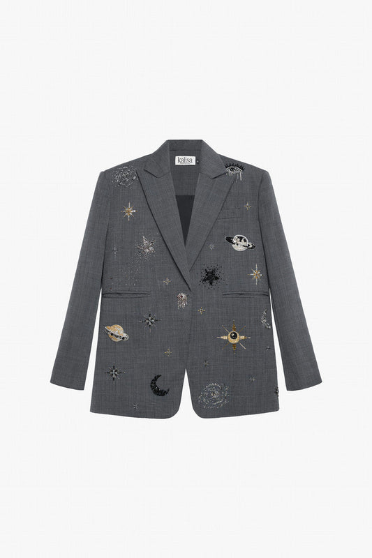 A grey blazer and skirt-pants set in tweed, with celestial embroidery and back slit.