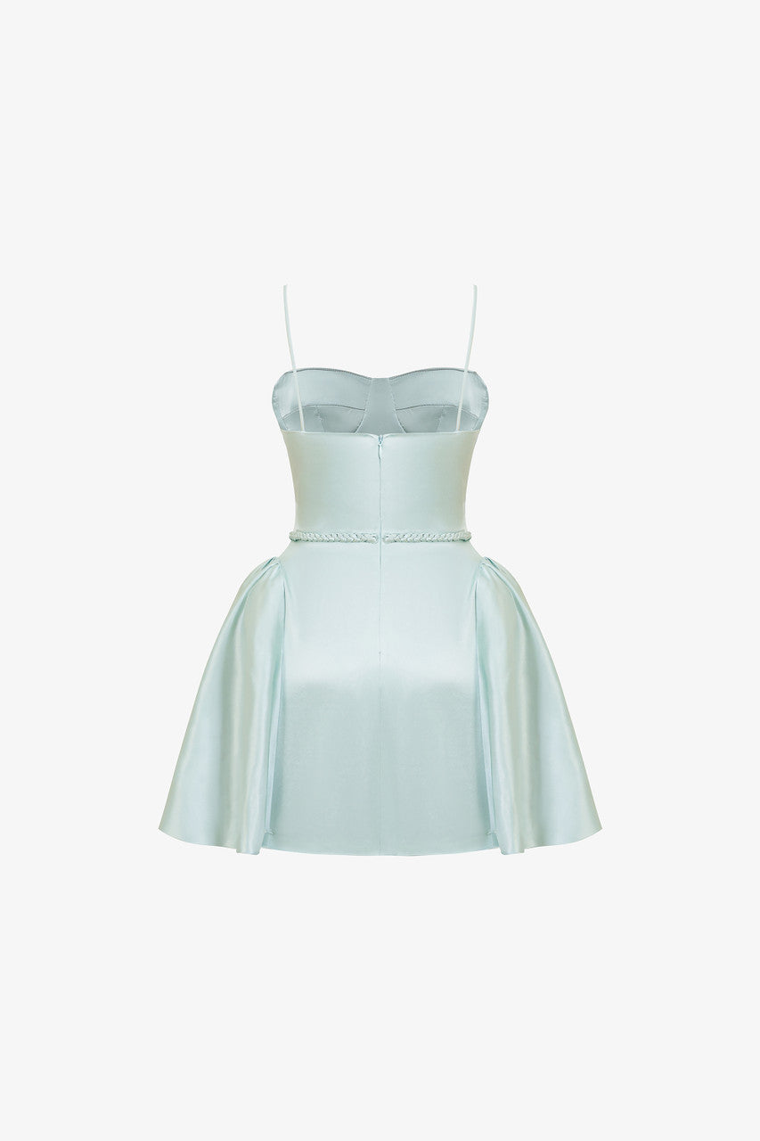 The green silk mini dress with woven tie detail around the waist, sleek spaghetti straps and slightly flared skirt.