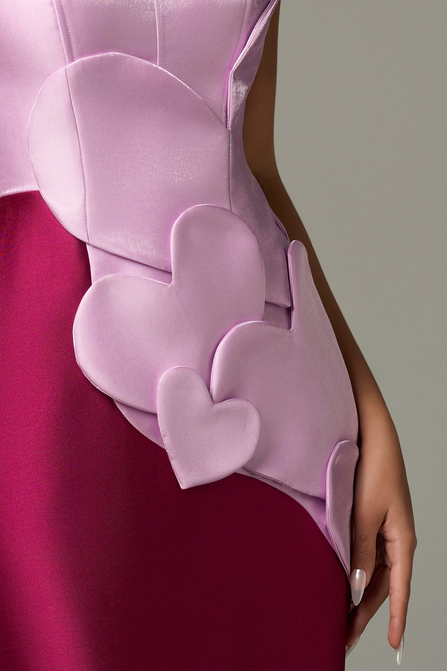 Heart-shaped maxi dress combines purple and pink tones, heart motifs on the body of the dress.