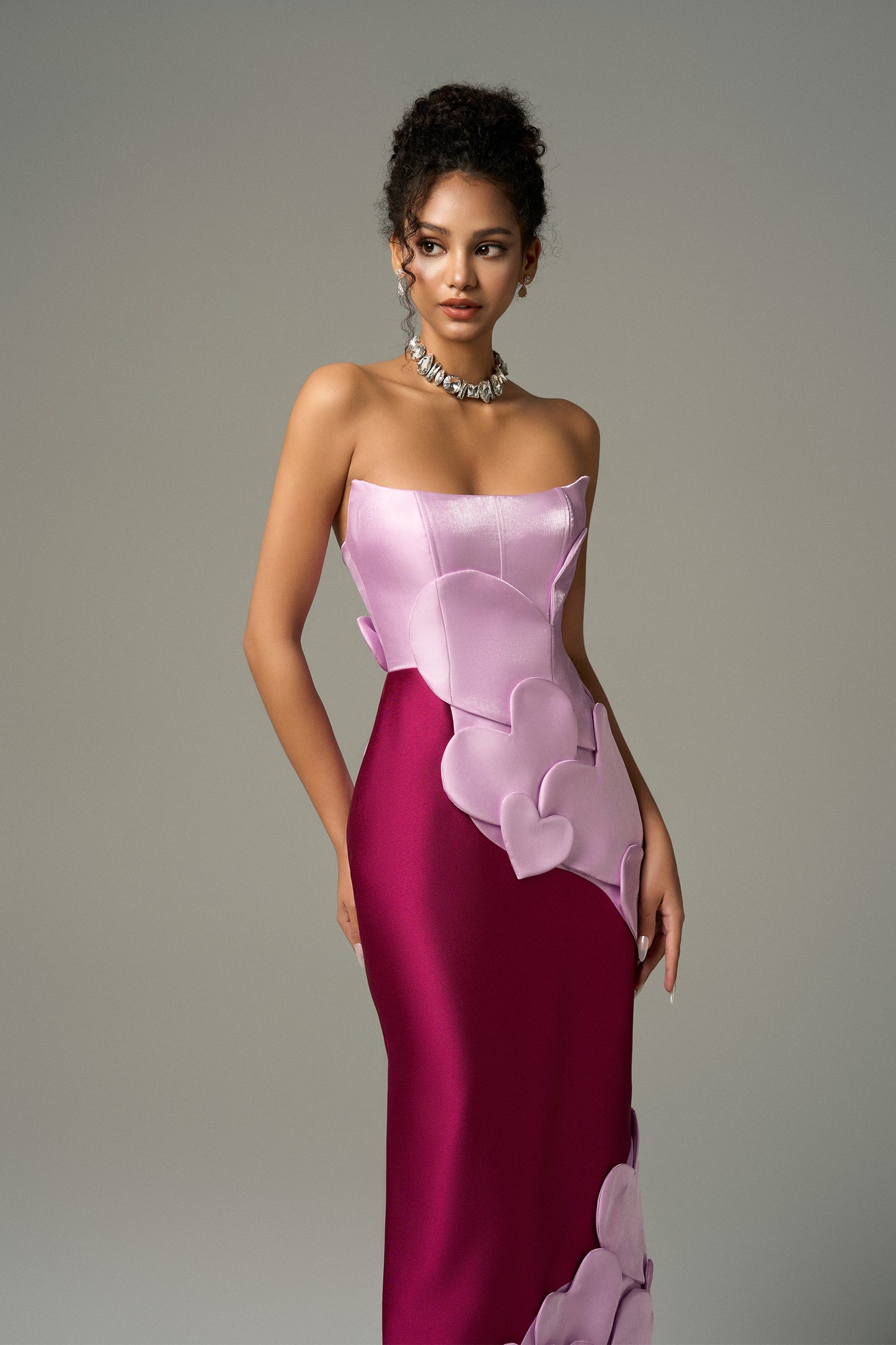 Heart-shaped maxi dress combines purple and pink tones, heart motifs on the body of the dress.