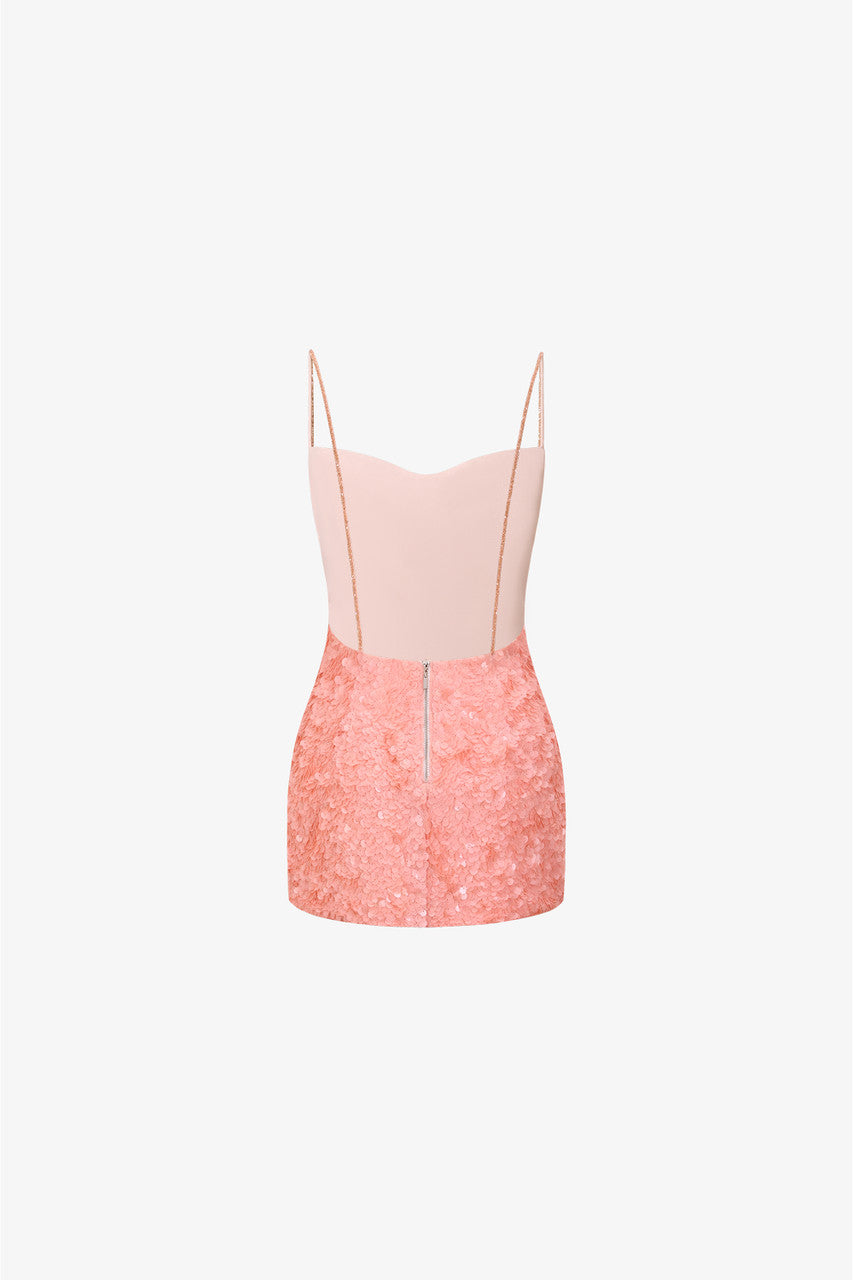 The pink mini dress made with dazzling sequin fabric and crystal-embellished spaghetti straps.