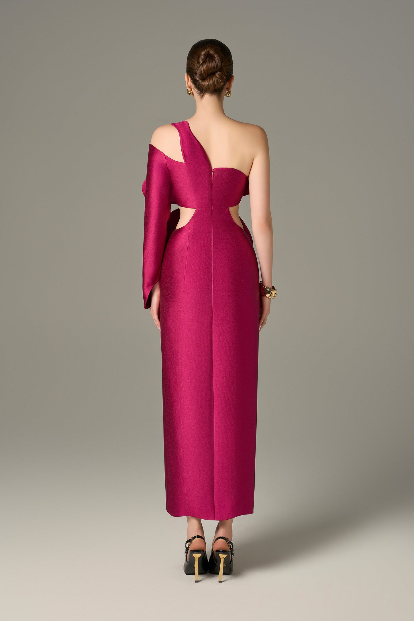 Pink Petal Floral Maxi Dress features an asymmetrical one-sleeve design and cut out on both sides of waist.