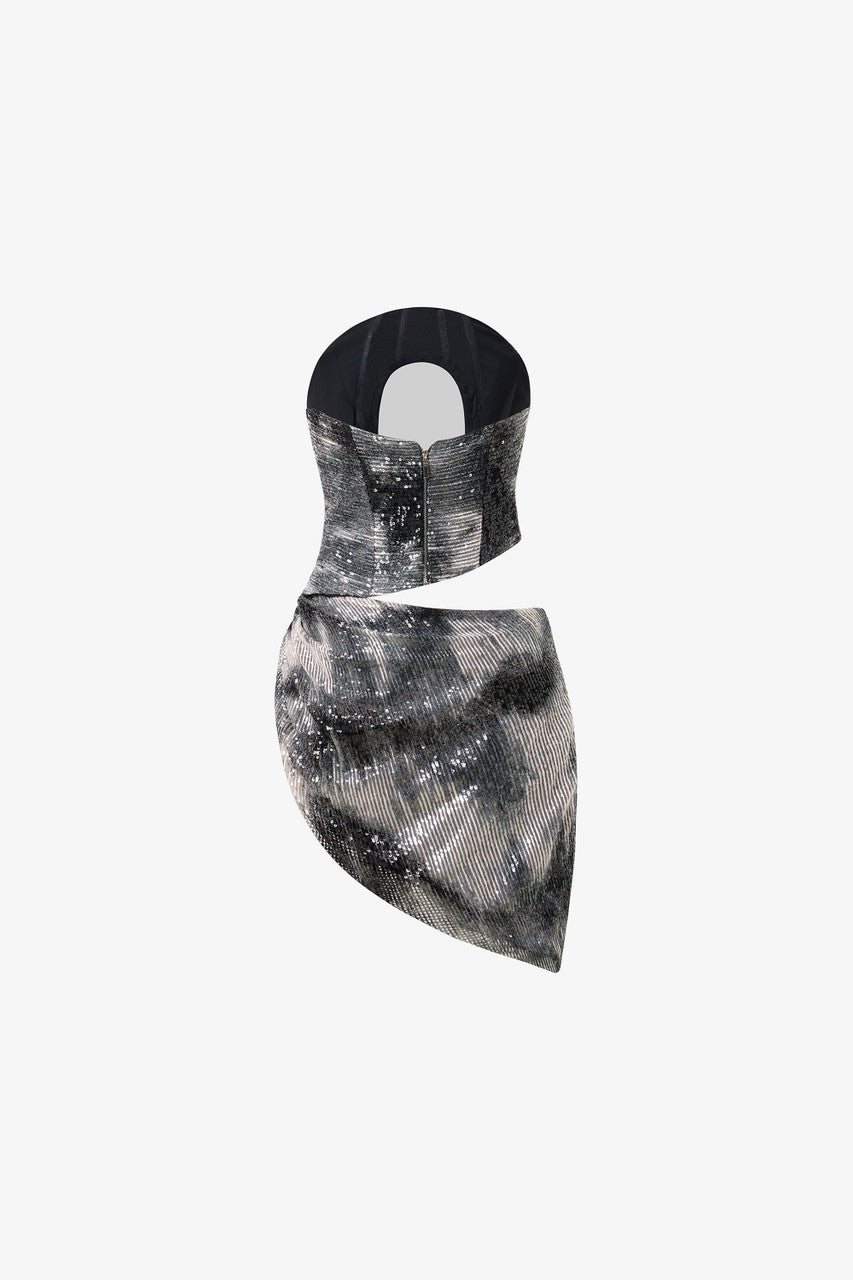 The black sequin mini dress with daring cutouts and mesh-trimmed corset.