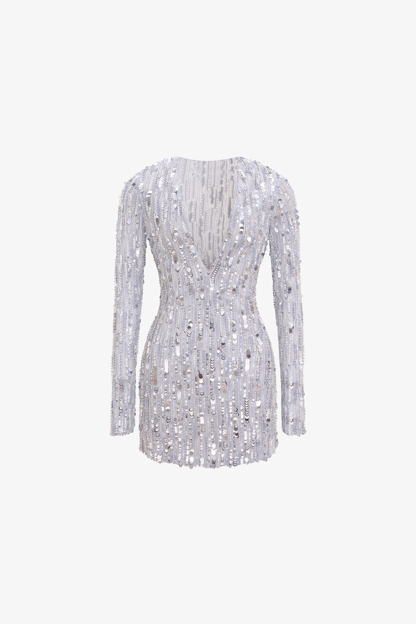 The sequin mini dress in grey with V-neckline and long sleeves.