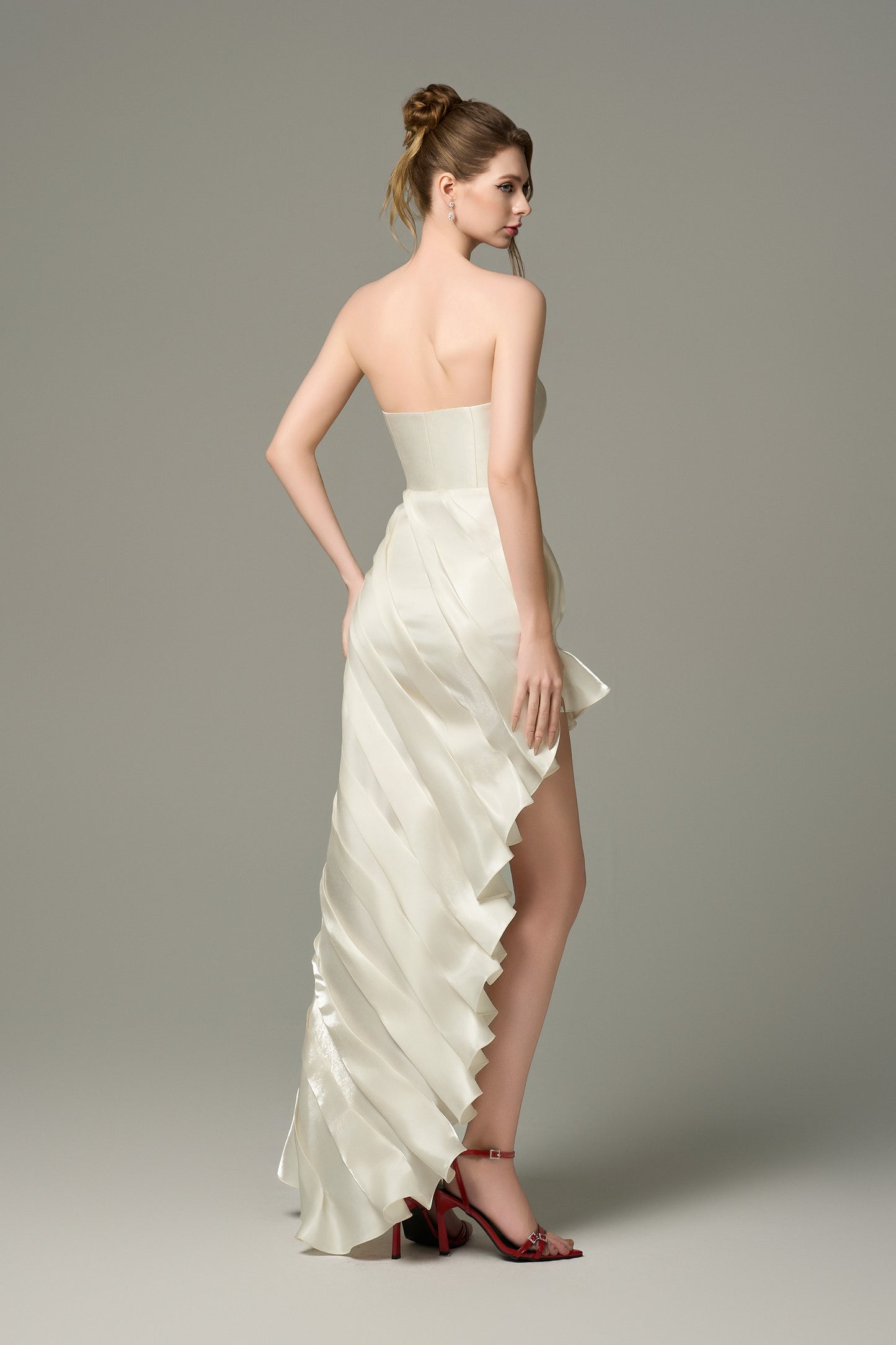 The cream split maxi dress drapes beautifully and is ideal for statement-making moments.