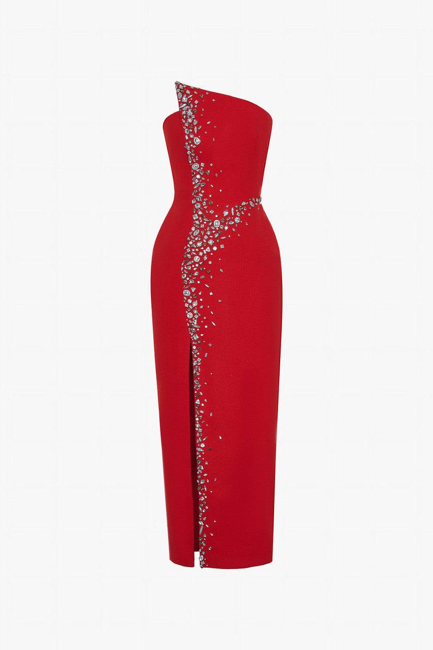 Red maxi dress in felt, with a strapless neckline, crystal embellishments and a thigh-high slit.