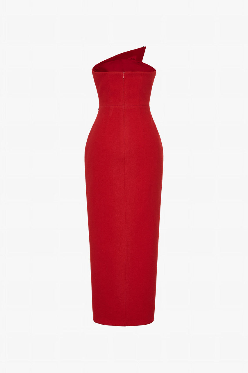 Red maxi dress in felt, with a strapless neckline, crystal embellishments and a thigh-high slit.