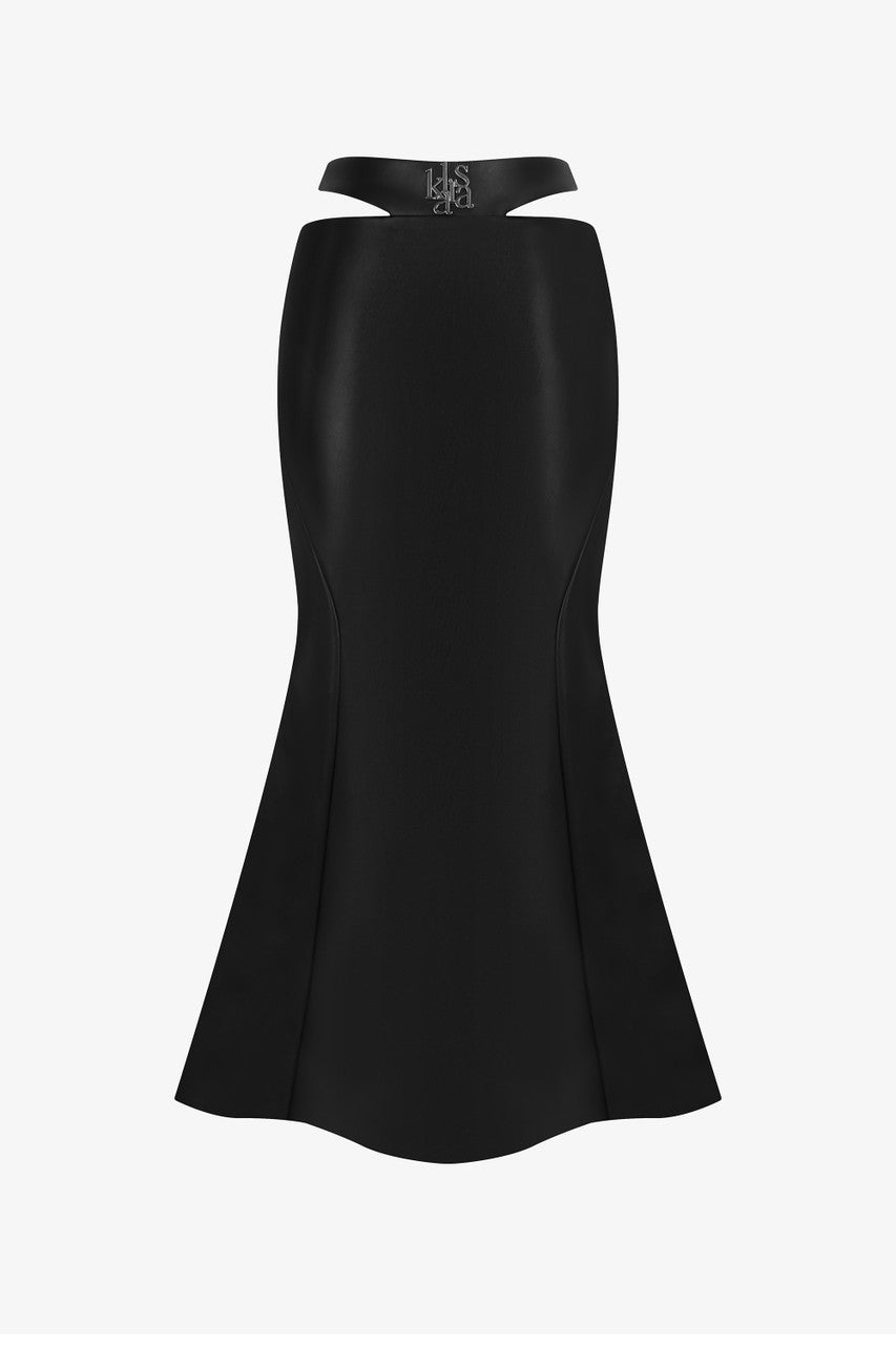 The Black High-Waist Leather Long Skirt with a mermaid silhouette and bold cut-out details. 
