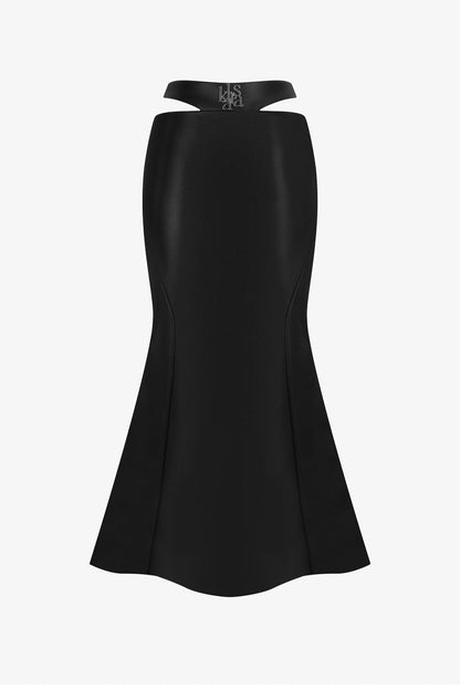 The Black High-Waist Leather Long Skirt with a mermaid silhouette and bold cut-out details. 