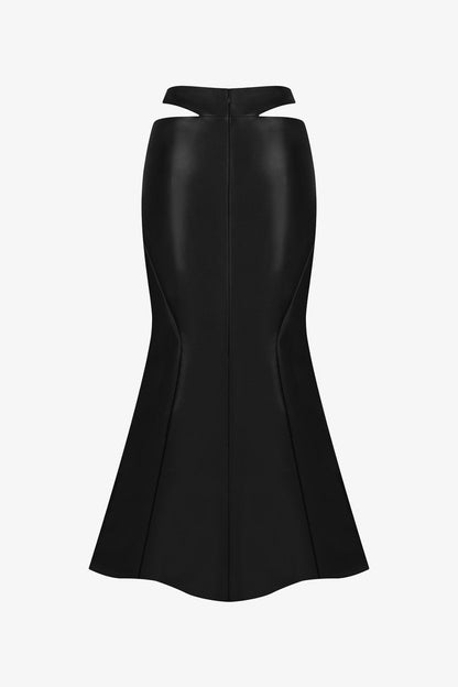 The Black High-Waist Leather Long Skirt with a mermaid silhouette and bold cut-out details. 