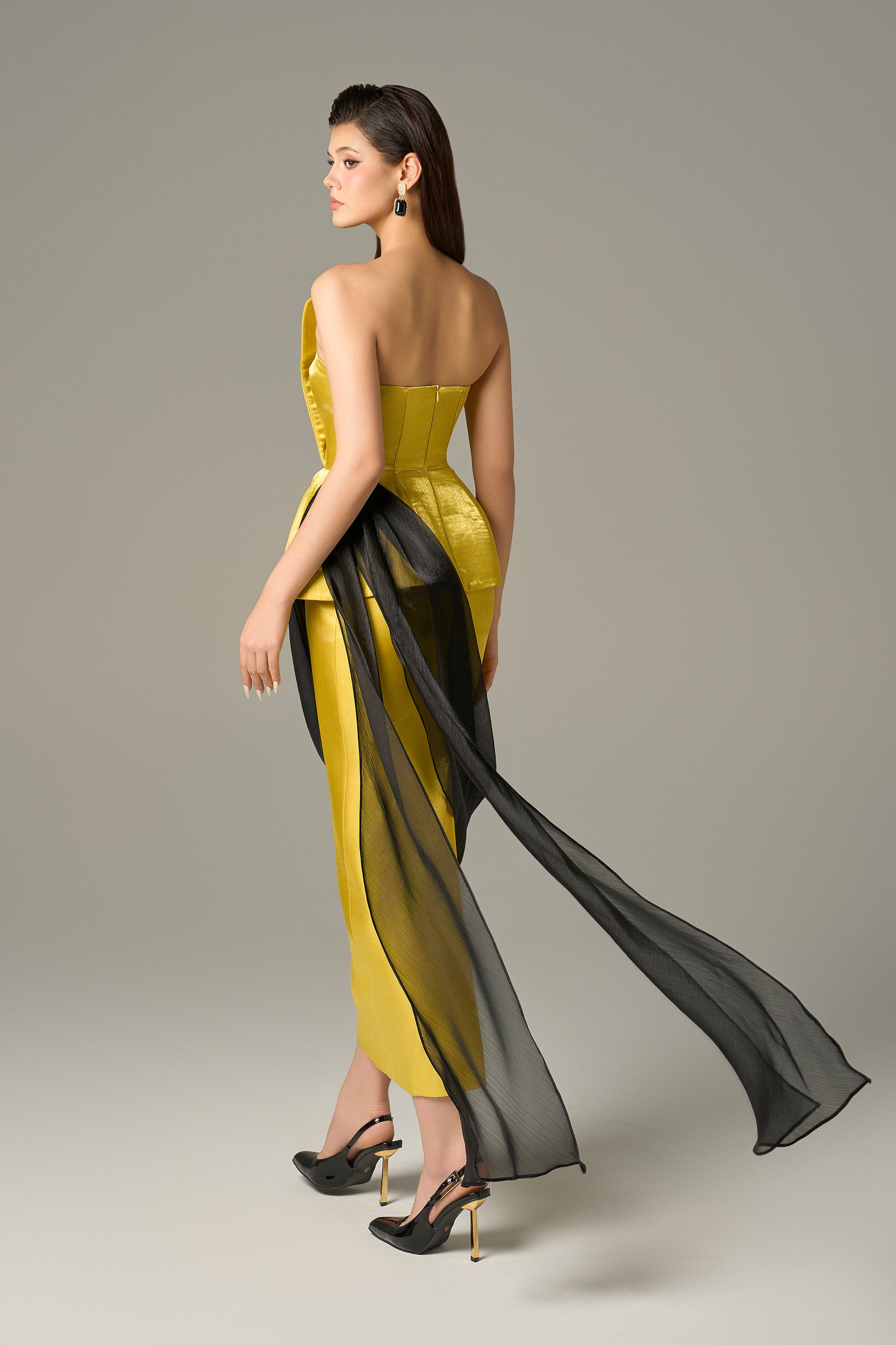 Yellow maxi dress with long black silk flap.