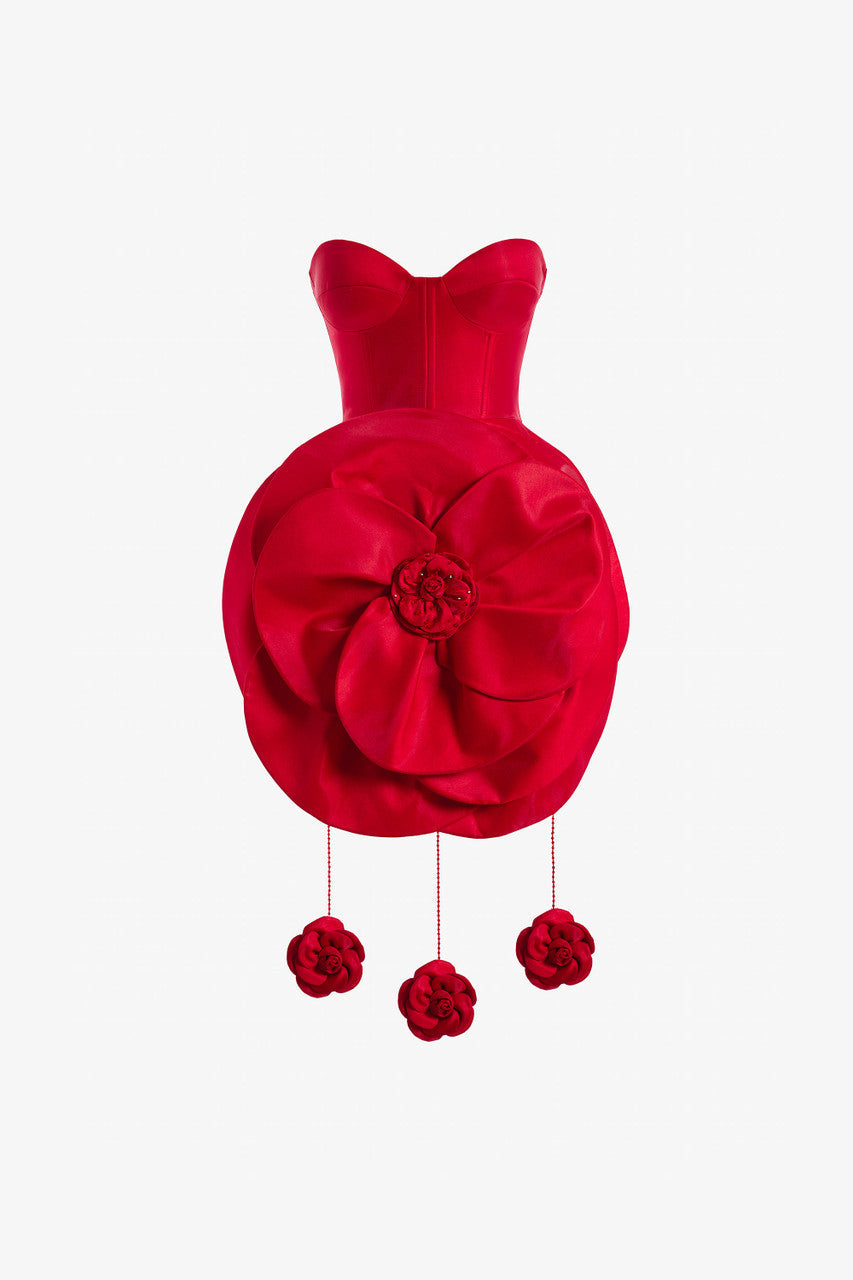 A red taffeta mini dress, featuring a cat-eye bust and a voluminous flower-like skirt with rose accents.