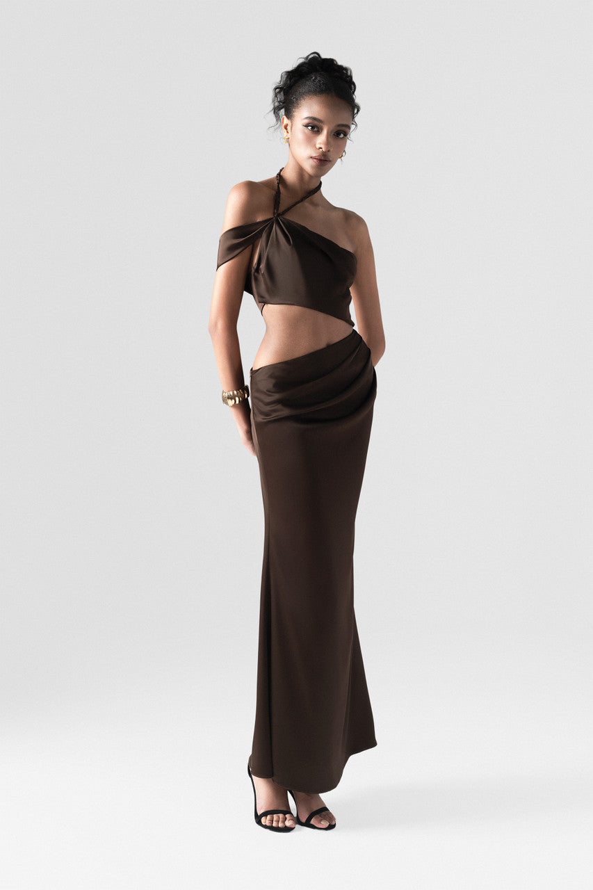 Brown maxi dress in premium silk, crafted with side cutouts, high side slit, and handwoven neck strap.