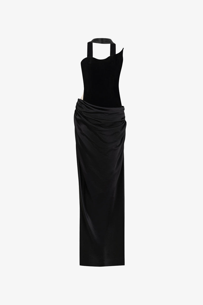 The black maxi dress, combining two premium fabrics: velvet and silk, featuring a matching silk scarf and gloves. 