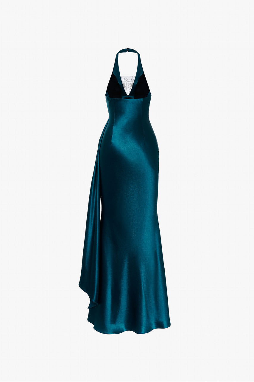 Maxi dress in dark mallard silk, with a halter neckline and a draped detail.