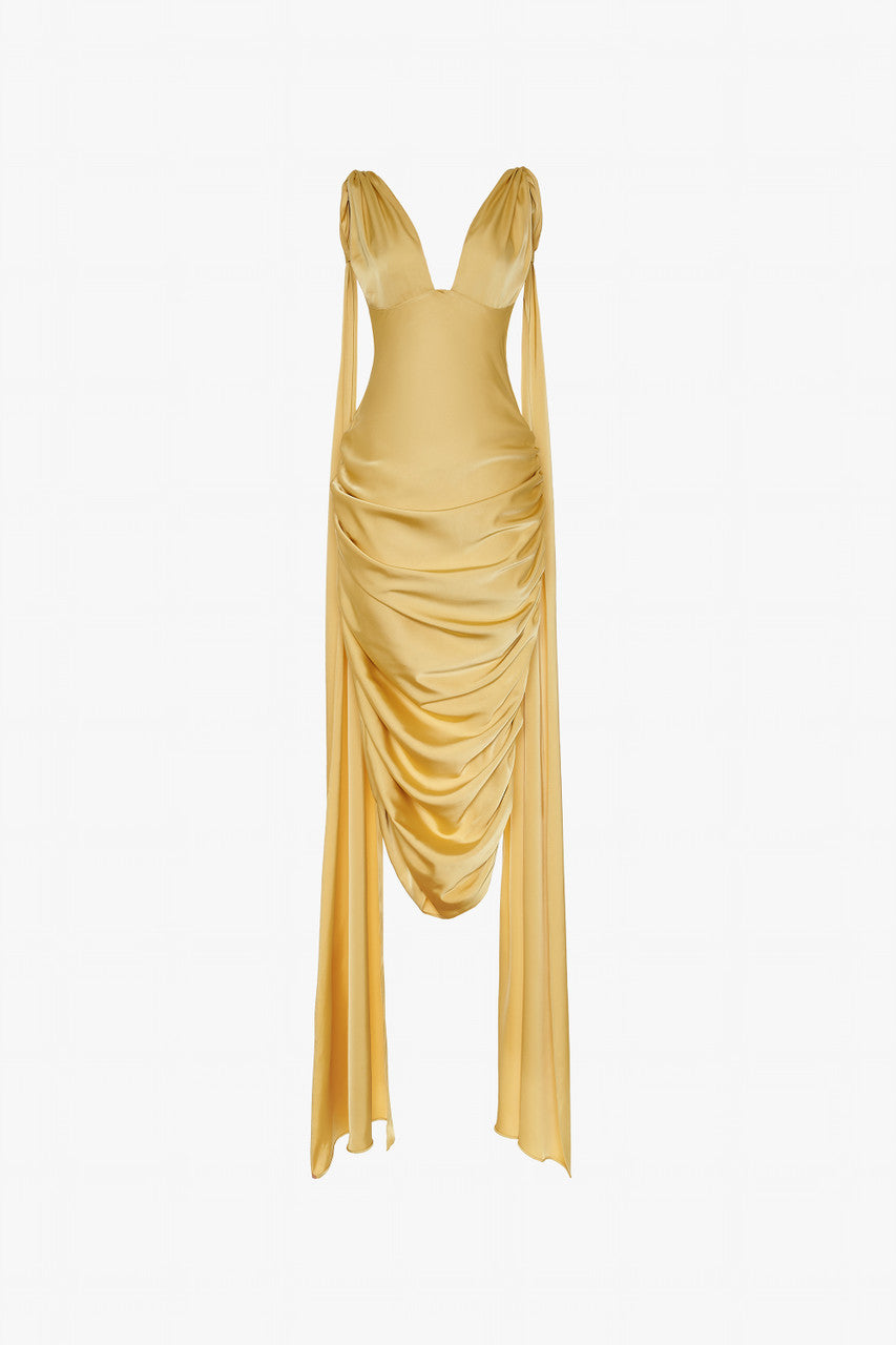 A gold yellow silk dress with V-neckline and two flowing silk flaps.