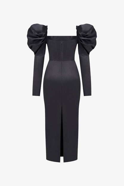 Black leather maxi dress with a square neckline and puffed long sleeves. 