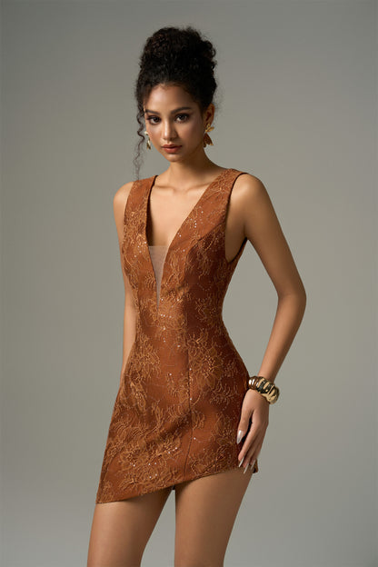 The Brown Midi Dress features a figure-hugging silhouette with a deep V-neckline, crafted with a lace overlay and shimmering sequins.
