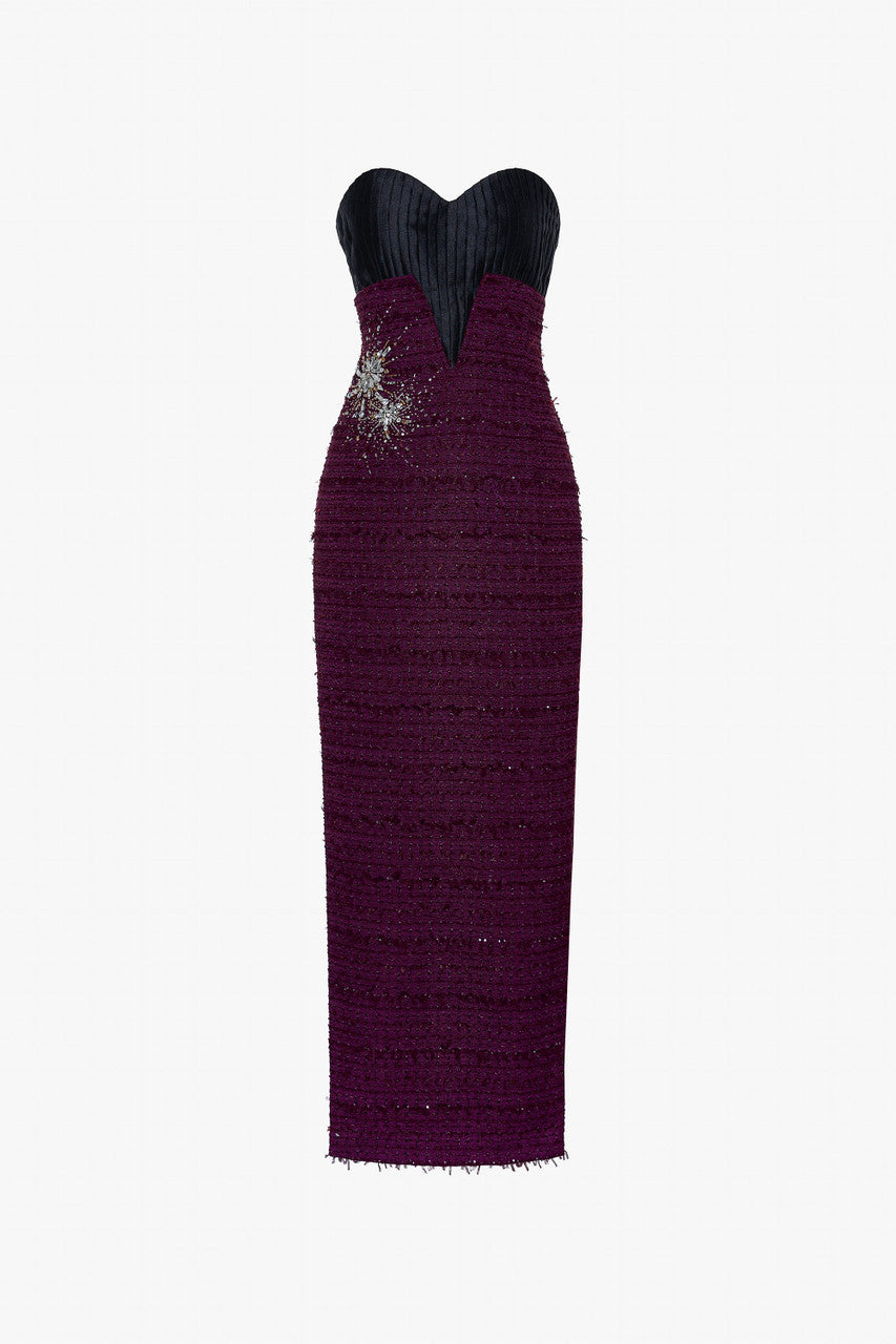 a Burgundy tweed maxi dress with side slits, firework-inspired embellishments and a cropped jacket.