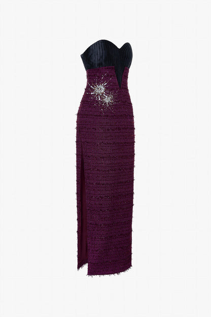 a Burgundy tweed maxi dress with side slits, firework-inspired embellishments and a cropped jacket.