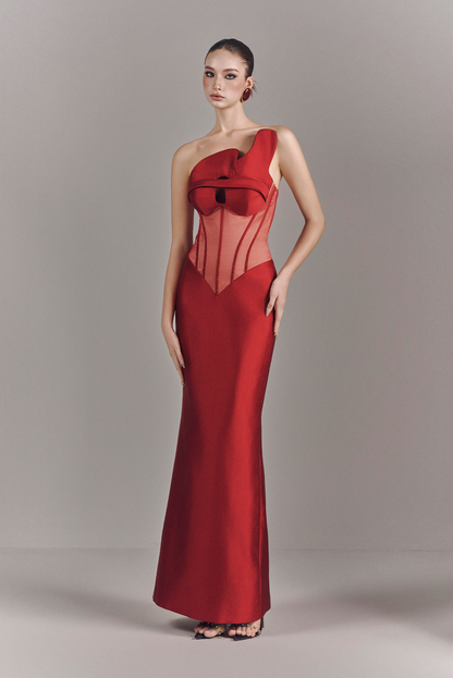 Red one-shoulder evening gown on a model against a neutral background