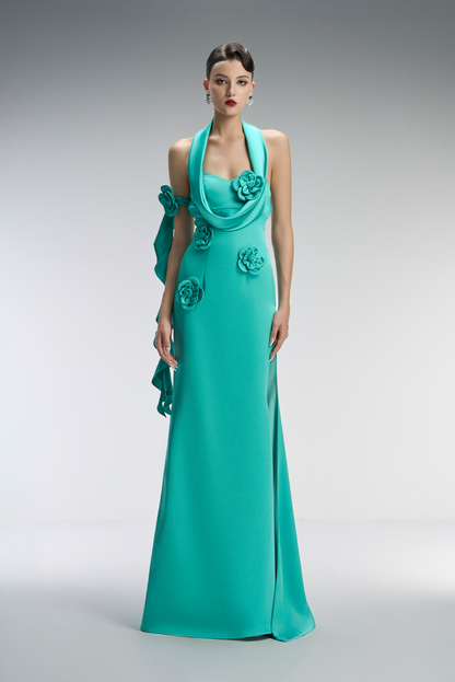 Teal evening gown with floral embellishments