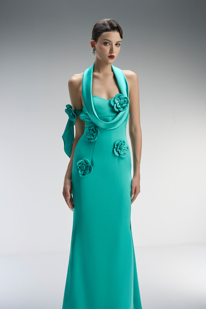 Teal evening gown with floral embellishments