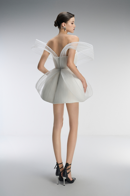 A white dress with black floral details