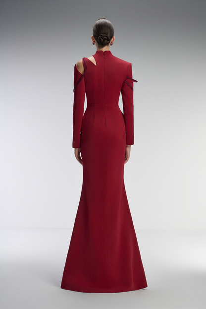 Red evening gown with cut-out shoulder