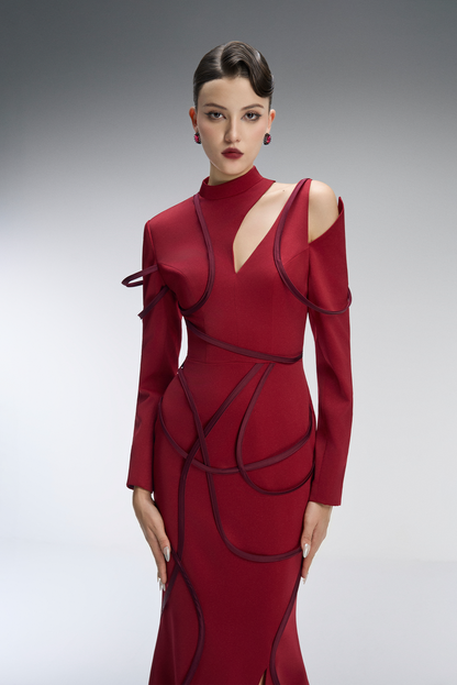 Red evening gown with cut-out design