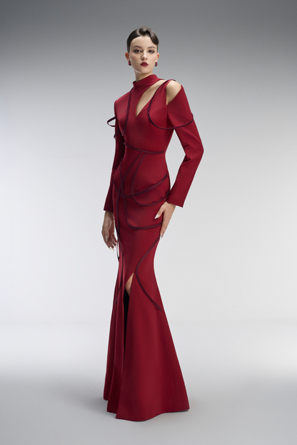 Red evening gown with cut-out design