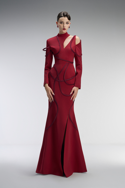 Red evening gown with cut-out design
