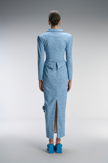 A blue dress with floral embellishments