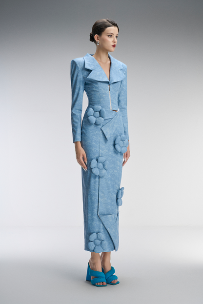 A blue dress with floral details
